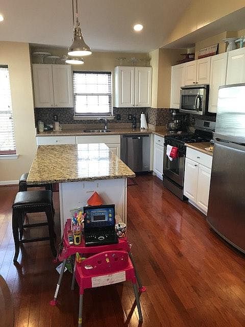Large Kitchen with Island & Hardwood Floors