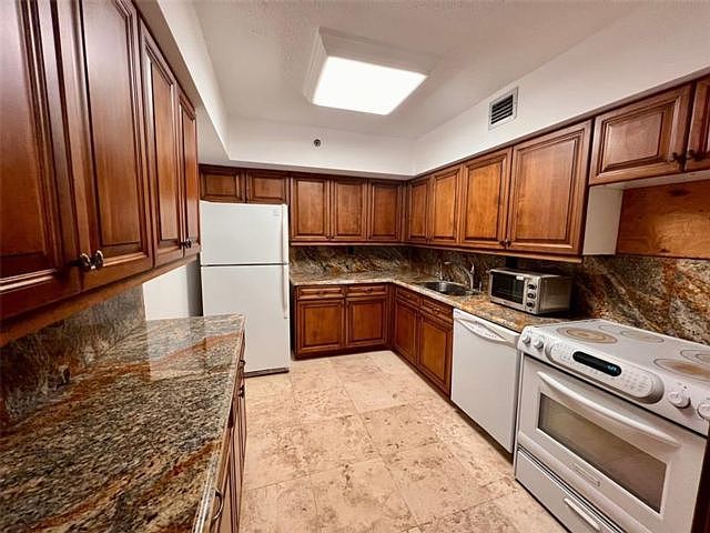 1st image of 3600 Mystic Pointe Dr APT 1214