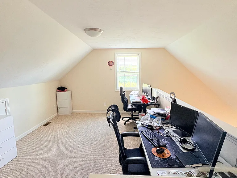 Loft with plenty of room for home office or creative space.