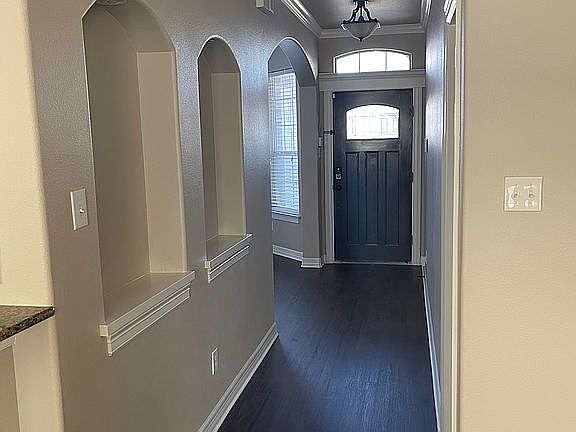 HALLWAY TO FRONT ENTRANCE