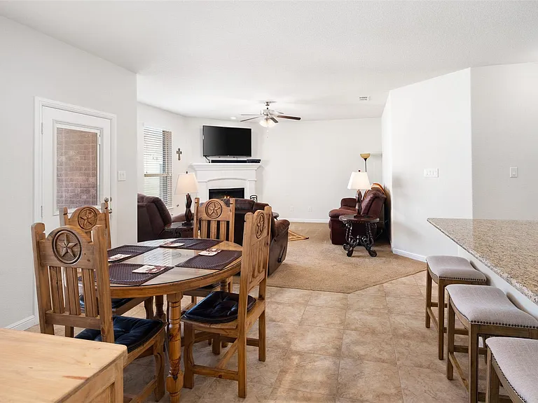 The pictures were taken while the home was occupied. None of the furniture is included with the home.