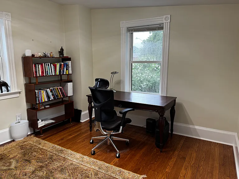 4th bedroom or office w/ laundry looking towards back of house.