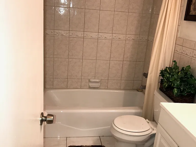 large 2nd bathroom with tub and shower