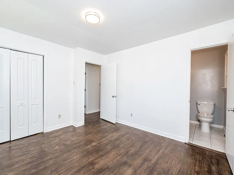 Another view of the primary bedroom