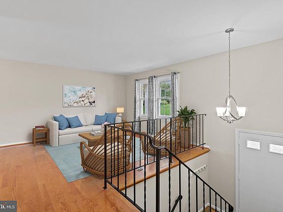 Foyer opens to light-filled living room