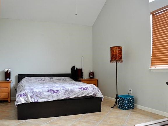 Large Bedroom with Vaulted Beam Ceiling.