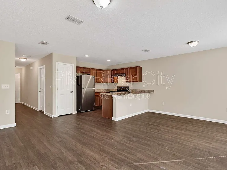 7608 Rain Forest Dr N — Photo 1