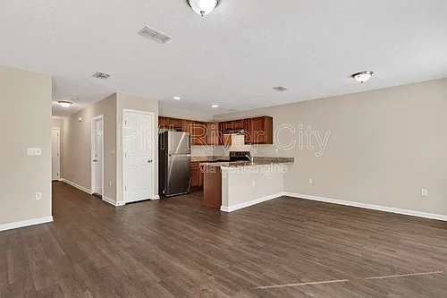 7608 Rain Forest Dr N Photo 1