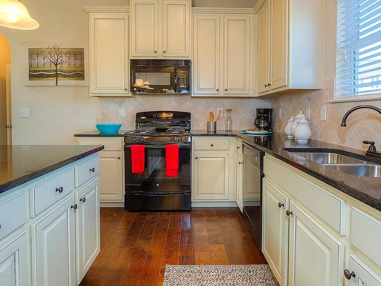 Kitchen ( Actual House has floor and cabinet stain)