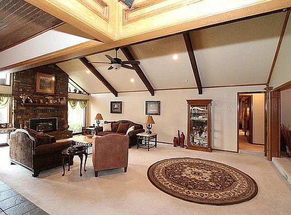 Vaulted & beamed family room open to the kitchen