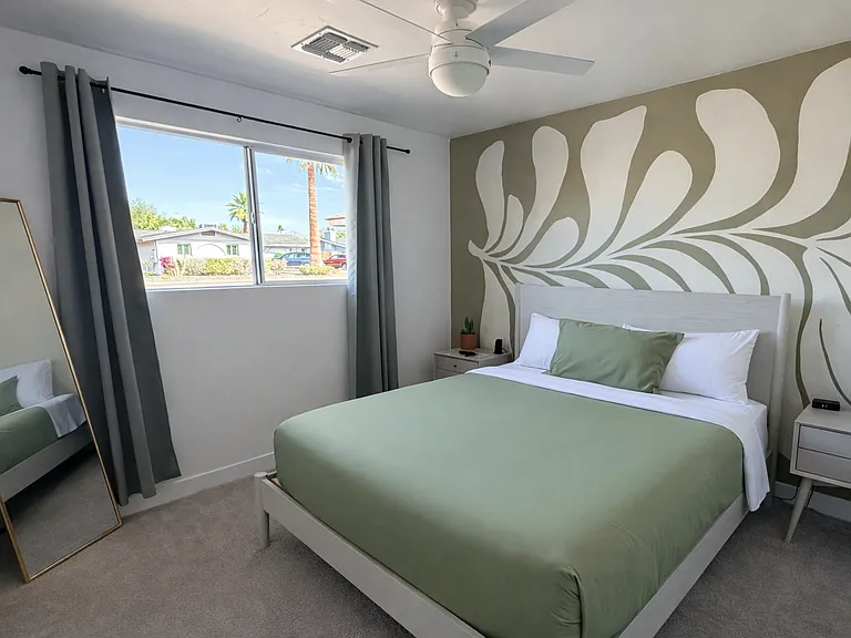 Bedroom with Queen Bed and Mural
