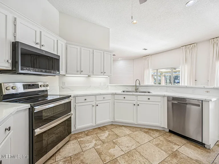 3447 Heron Dr N — Photo 16