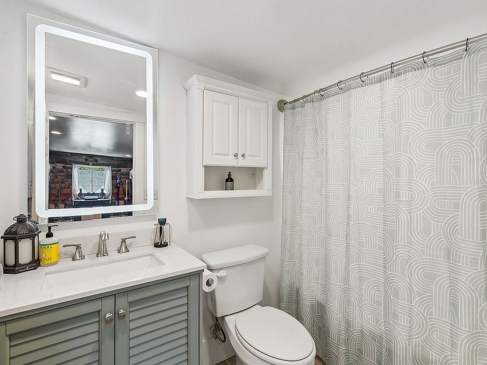 Comfortable bathroom with a smart mirror.
