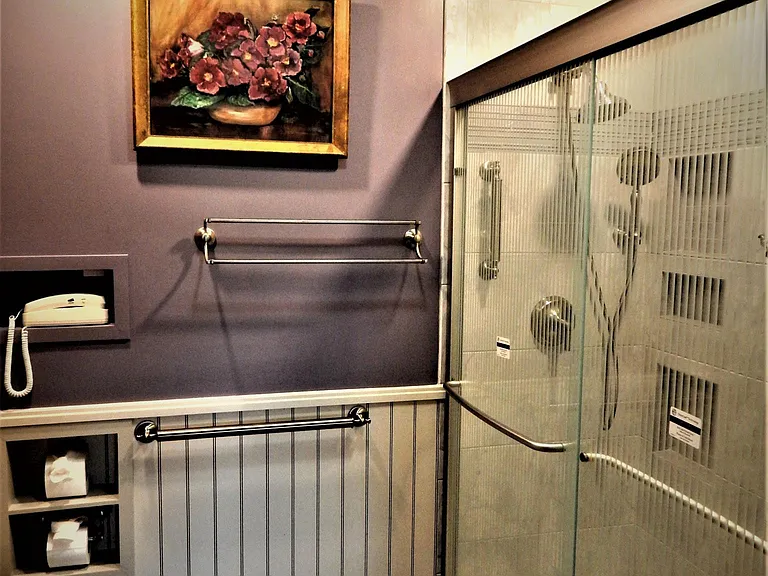 master bathroom Kohler safety tread shower base & glass sliding shower doors