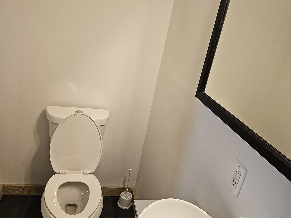 The bathroom features updated fixtures that give the space a clean, modern feel.