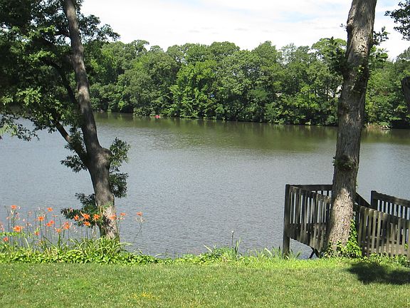VIEW OF REAR YARD AND LAKE