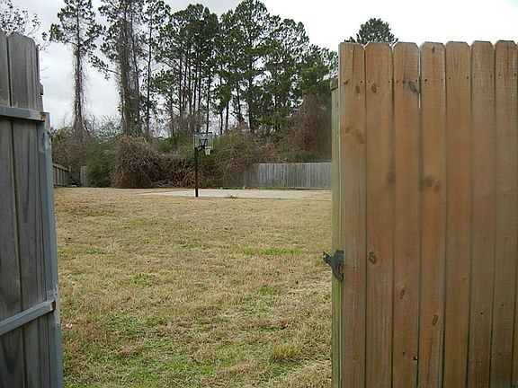 Front left gate view of basketball court