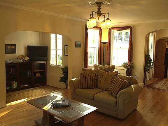 Den and Study feature original heart pine flooring.