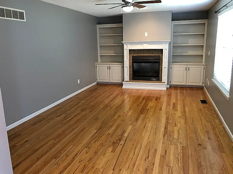 Family Room/Great Room with built-ins, decorative fireplace