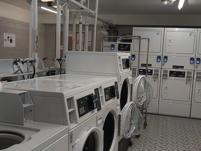 Laundry room. Includes front loaders and top loaders, and driers. I never have trouble finding something available.