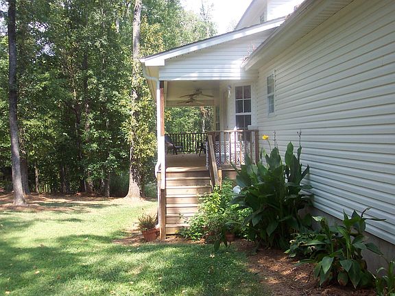 Covered porch over looking private back yard