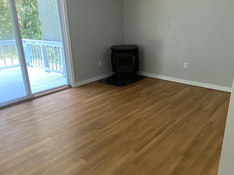 Large living room. Pellet stove makes it cozy and warm in the winter!