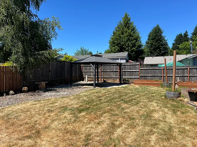 Fully Fenced Backyard with Gazebo