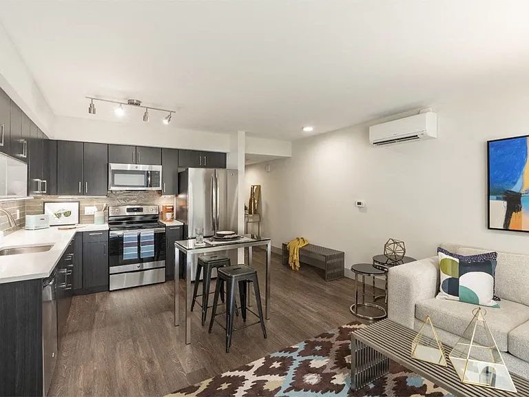 Air conditioning and luxury vinyl plank flooring throughout South Building apartments