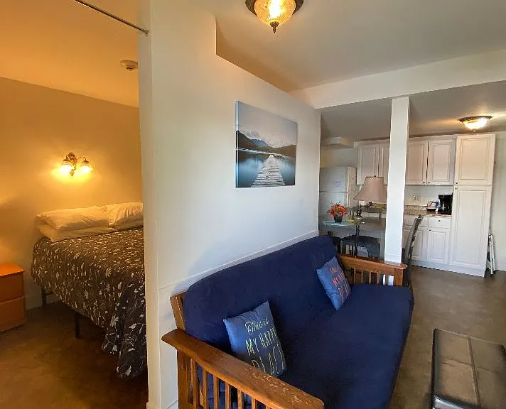 Separate bedroom with queen bed