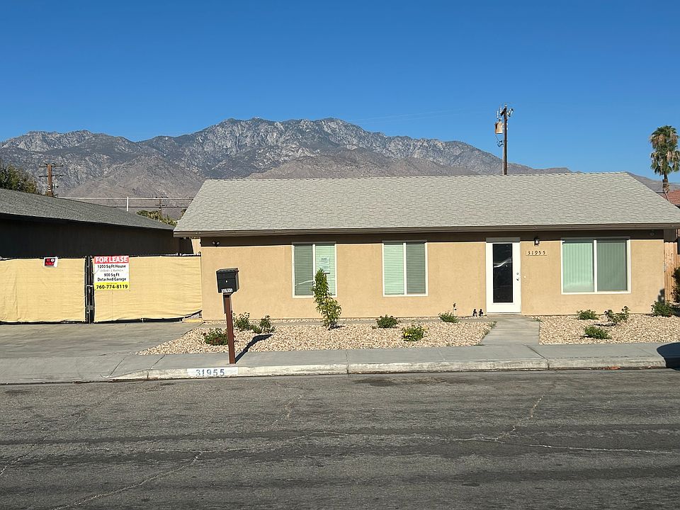 Front elevation. 2-10' gates to access concrete courtyards.