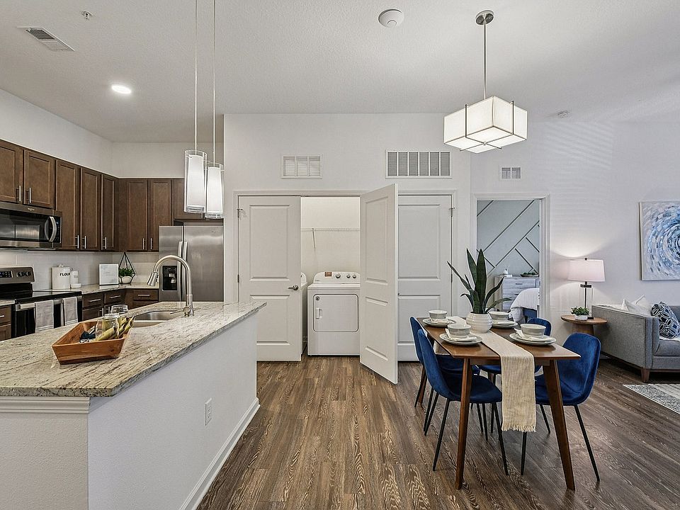 Experience modern living in this airy, sunlit space with sleek design features.