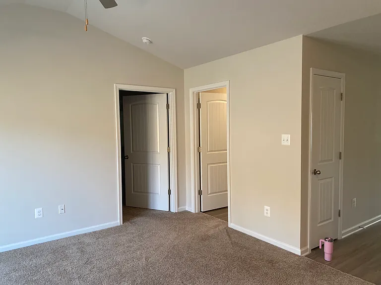 Master bedroom - door on the left
Laundry room and garage - door on the right