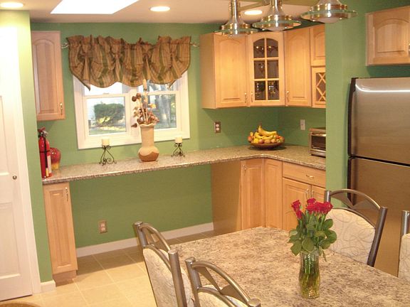 Kitchen - New windows, skylight, nicely tiled, and newly insulated