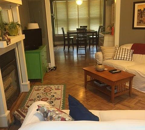 Living room opens into dining room