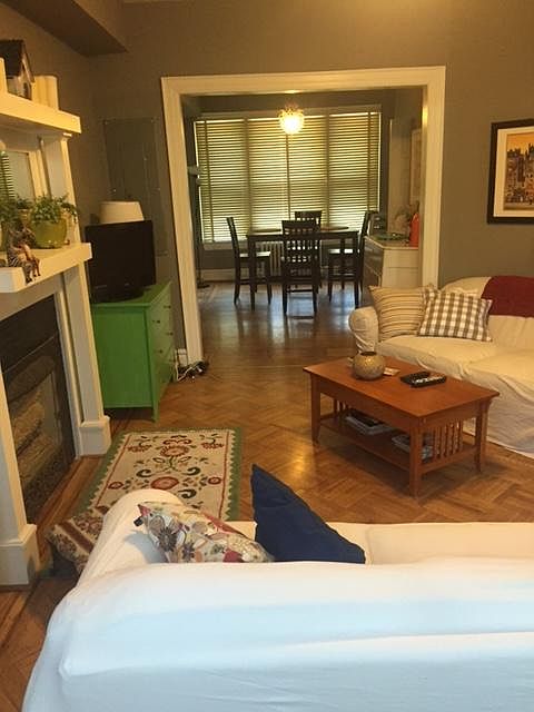 Living room opens into dining room