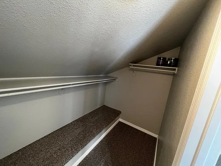 Upstairs walk in closet