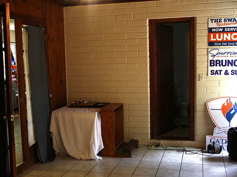 Double door to living room and single door to Jack and Jill Bathroom