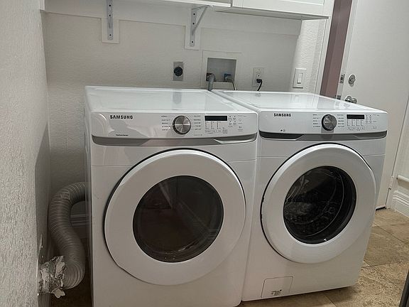Full-size front-loading washer and dryer in your own interior storage space.