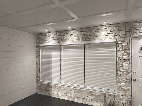 BRAND NEW windows and 
DESIGNER 2" BLINDS throughout!
Windows offer high energy rating as well as high storm rating! Stay safe and secure while saving 
 on utilities!