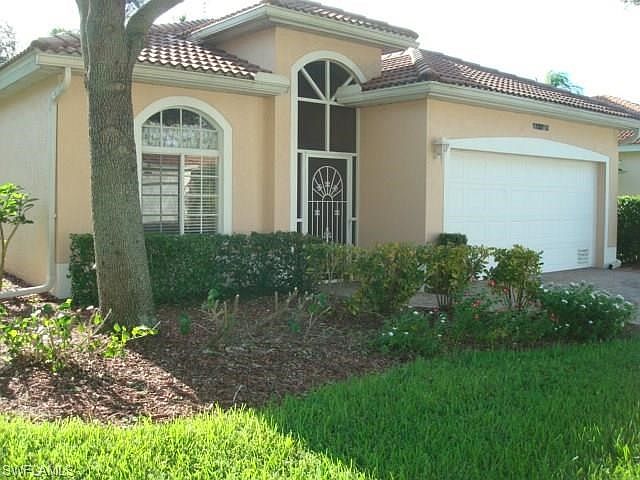 Front of Home with screened entry.