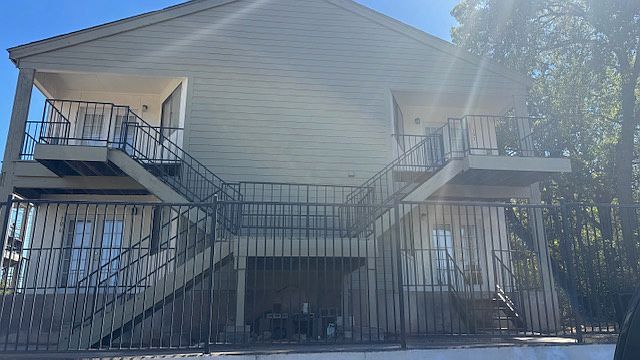 This unit is upstairs top right