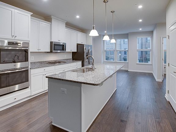 Beautifully appointed kitchen, gas cooking, double over, island with room for chairs