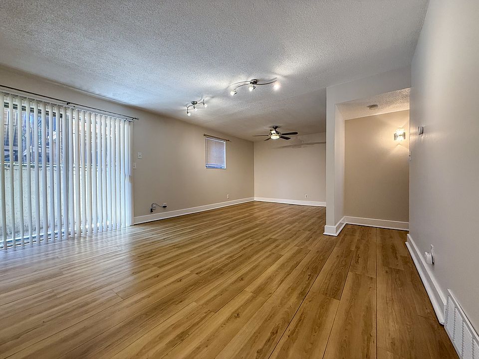 Living room & view of hallway leading to bedroom