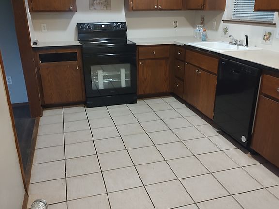 Great sized kitchen with laundry hook ups and a new stove