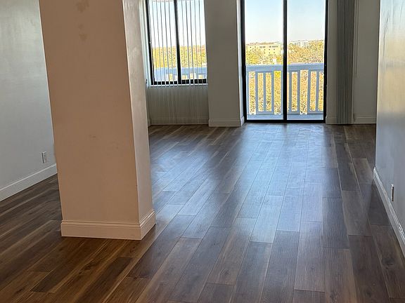 Living Room from front door looking toward balcony