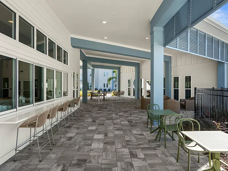 Experience relaxation in this chic outdoor lounge, designed for leisure and comfort.
