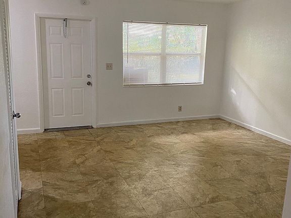 5th image of 830 NE 43rd Ct