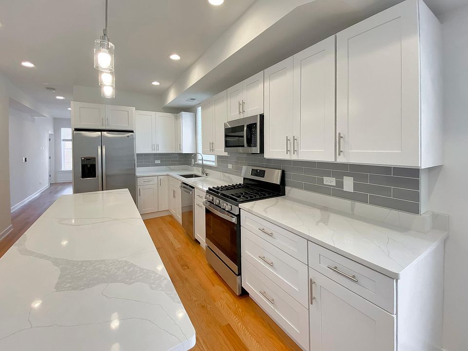 Kitchen with island seating and storage
