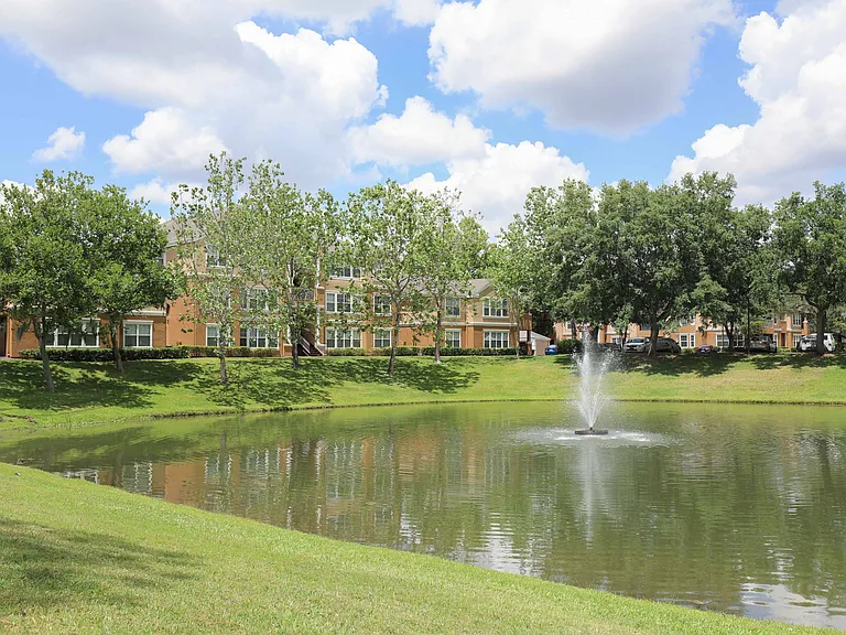 Enjoy peaceful views of our scenic pond and open green space
