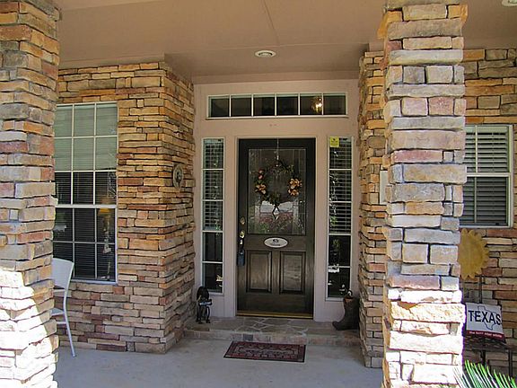 Welcome Home!Stacked stone & Hardiplank exterior. Garage is oversized to approx 2.5 car.